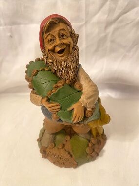 Clarks Red-Hat Woodland Gnome Sculpture with Green Leaves